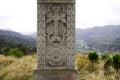 Stone cross monument the victims of massacre