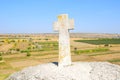 Stone Cross near Christian Orthodox church in Old Orhei