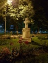 Stone cross in Politehnica park in Bucuresti at night Royalty Free Stock Photo