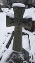 A stone cross standing proud