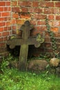 Stone cross tombstone in a cemetery Royalty Free Stock Photo