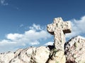 Stone cross under cloudy sky Royalty Free Stock Photo