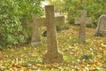 Stone crosses in the old cemetery in autumn Royalty Free Stock Photo