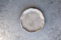 Stone curl gray platter on conrete table