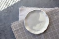 Stone curl gray platter on conrete table