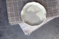 Stone curl gray platter on conrete table