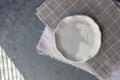 Stone curl gray platter on conrete table