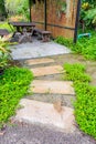 Stone curved walkway in garden Royalty Free Stock Photo