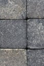 Stone dark textured background close up. Natural gray backdrop or wallpaper. Rough shabby surface. Soapstone whiskey rocks.