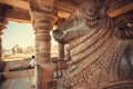 Stone diety bull Nandi near sacred Hindu temple Hoysaleshwara with murble carvings