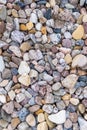 Stone diffirent quartz sand background top view round