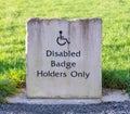 Stone Disabled Badge Holders Only parking sign Royalty Free Stock Photo