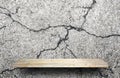 Stone display shelf on crack cement wall Royalty Free Stock Photo