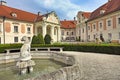 Stone dog and dwarfs statues in courtyard, castle Lamberg, Steyr, Upper Austria Royalty Free Stock Photo
