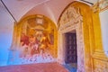 The stone doorframe and the fresco in small cloister of Certosa