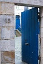 Stone entryway beautiful blue doors Royalty Free Stock Photo