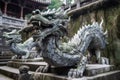 stone dragon sculptures guarding temple steps