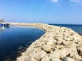 Stone embankment in the yacht lagoon