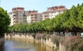 Stone embankments and a green park on the banks of the Dim River, Alanya, Turkey, April 2021 Royalty Free Stock Photo