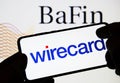 Wirecard logo on smartphone and BaFin Federal Financial Supervisory Authority logo on the Royalty Free Stock Photo