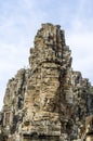 Stone face in the Bayon temple at Angkor Wat, Cambodia Royalty Free Stock Photo