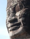 Stone face at the Bayon Temple in Cambodia Royalty Free Stock Photo