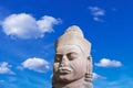 Stone face and blue sky, Angkor Wat, Cambodia Asia Royalty Free Stock Photo