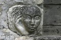 A stone face carving in OppÃÂ¨de le Vieux in the Luberon.