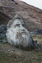 Stone face head in Sno valley in Georgia along the military road to Kazbegi