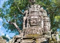 Stone face on the khmer tower in Angkor Wat temple in Cambodia Royalty Free Stock Photo