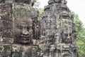 Stone face smile of ancient buddhist temple Bayon in Angkor Wat complex, Cambodia. Khmer art. Royalty Free Stock Photo