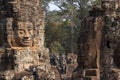 Stone faces in Bayon temple in ancient city Angkor Royalty Free Stock Photo