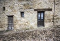 Stone faÃÂ§ade and cobble street Royalty Free Stock Photo