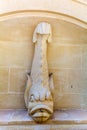 Stone fish-shaped drinking fountain in the Cittadella of Victoria in Gozo, Malta Royalty Free Stock Photo