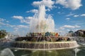 Stone flower fountain at Exhibition of achievements of the national economy VDNH in the contra light on a Sunny day. Moscow attr Royalty Free Stock Photo