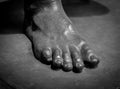 Stone foot of ancient Roman statue Royalty Free Stock Photo