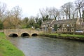 Stone footbridge landscape in cotswolds Royalty Free Stock Photo