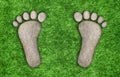 Stone footprints in the grass