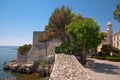 Stone fort walls from square and Frankopan castle at Krk