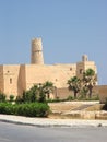 Stone fortress ribat with a tower and a mosque in the city of Royalty Free Stock Photo