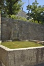 Stone fountain on wall