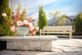 stone garden bench with rose bushes Royalty Free Stock Photo