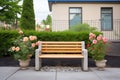 stone garden bench with rose bushes Royalty Free Stock Photo