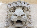 Stone gargoyle in Oxford on college wall