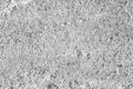 Stone Granite Wall, rough texture. Natural background of light gray color Royalty Free Stock Photo