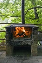 Stone Grill with fire and flame Royalty Free Stock Photo
