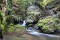 Stone guardian of the waterfalls - bizarre boulder on the bank