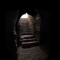 Stone hallway with upward staircase Royalty Free Stock Photo