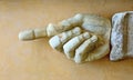 Stone hand showing direction Royalty Free Stock Photo