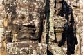 Stone head on towers of Bayon temple